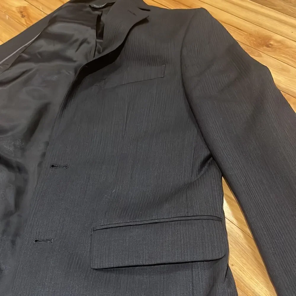 Marc Anthony black wool tonal pinstripe double button lined sport coat. 36S